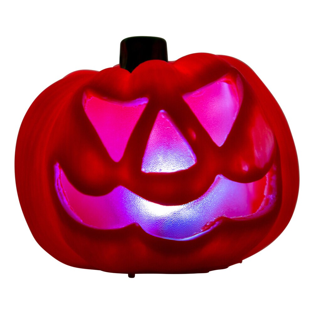 Valaiseva Halloween-kurpitsa väriä vaihtavalla valolla