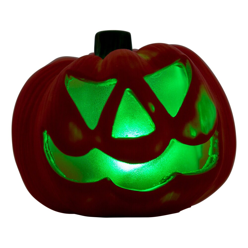 Valaiseva Halloween-kurpitsa väriä vaihtavalla valolla
