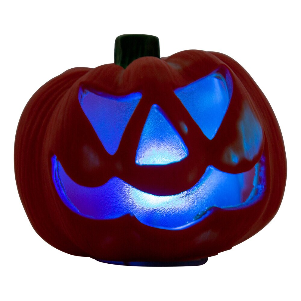 Valaiseva Halloween-kurpitsa väriä vaihtavalla valolla